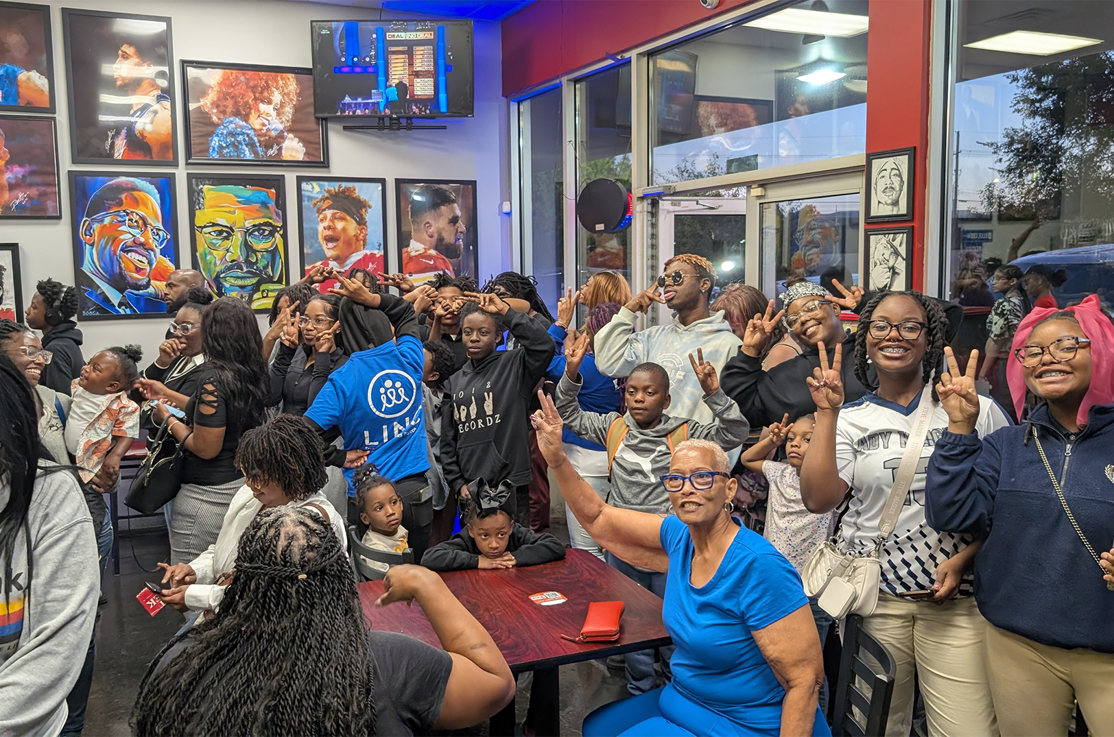 Black mothers and families gather at District Fish & Pasta House for the “People’s Food Buyout" — a kickoff event for KC Black Feast Week; photo courtesy of The Kansas City Defender