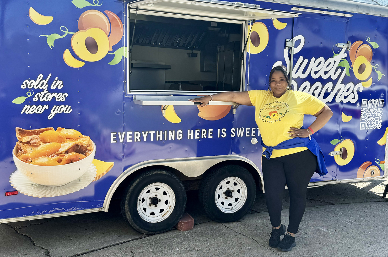 Denisha Jones with the Sweet Peaches Cobblers food truck; photo courtesy of Sweet Peaches Cobblers