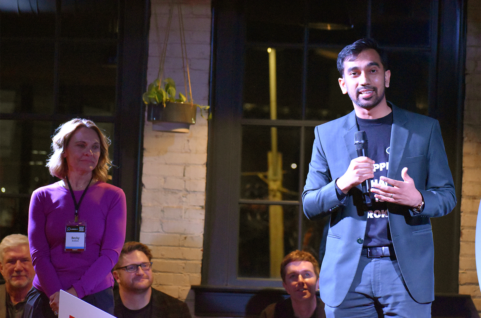 Russel Karim, SourceEazy, right, pitches his startup alongside co-founder Becky Arellano during LaunchKC's 2024 event; photo by Nikki Overfelt Chifalu, Startland News