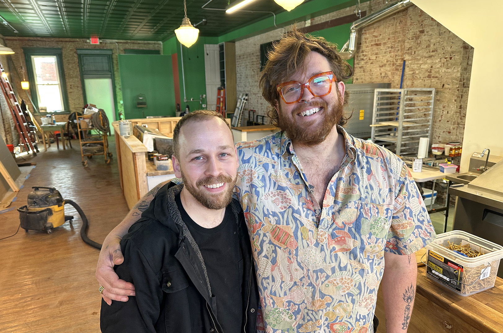 Noah Quillec and Max Popoff in the future home of Northeast Pizza at 2203 Lexington Ave.; photo by Joyce Smith