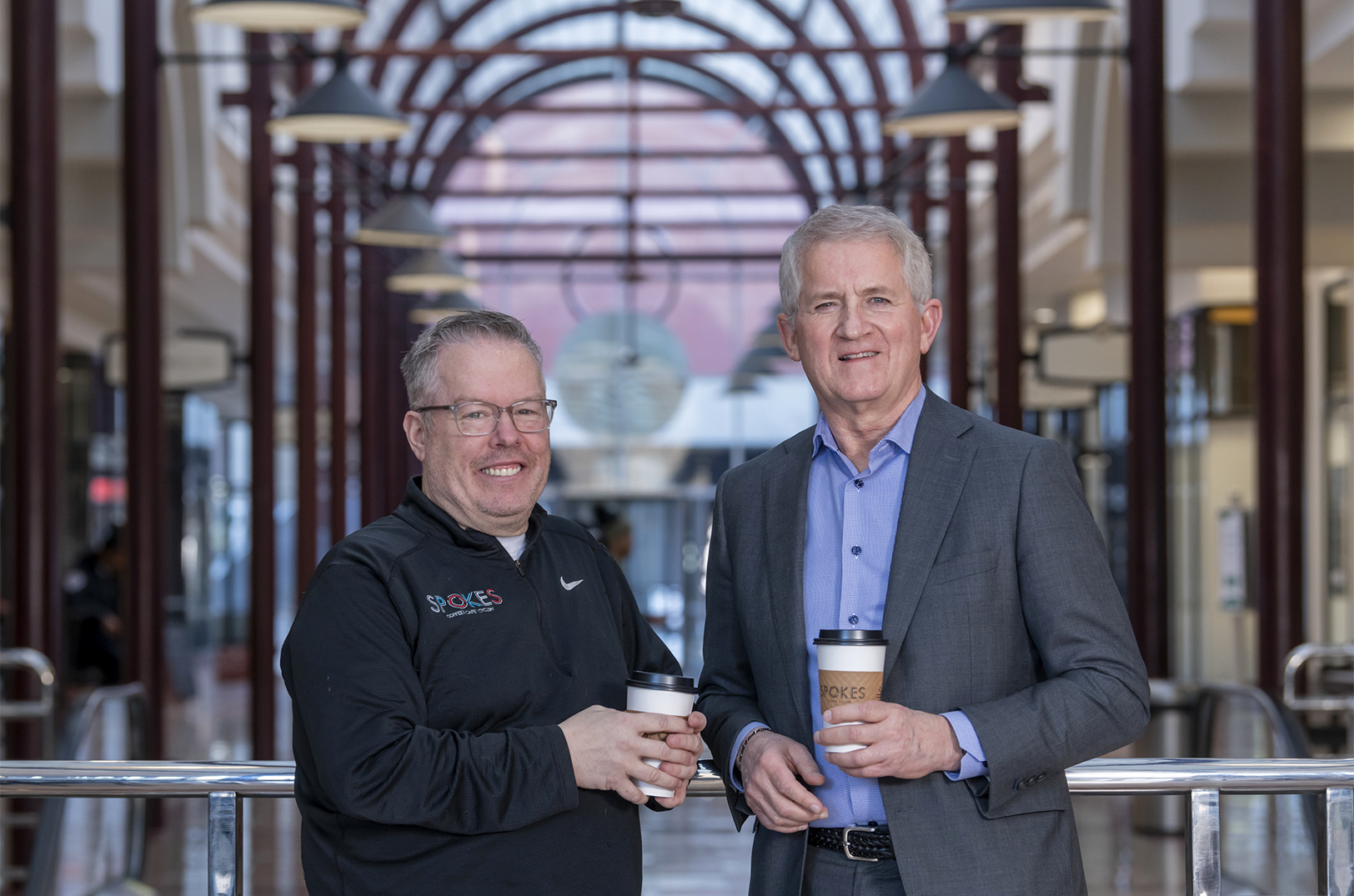 Dan Walsh, Spokes Café, and Kevin Barth, Commerce Bank, inside the arcade at Commerce Bank in downtown Kansas City; photo by Mark McDonald