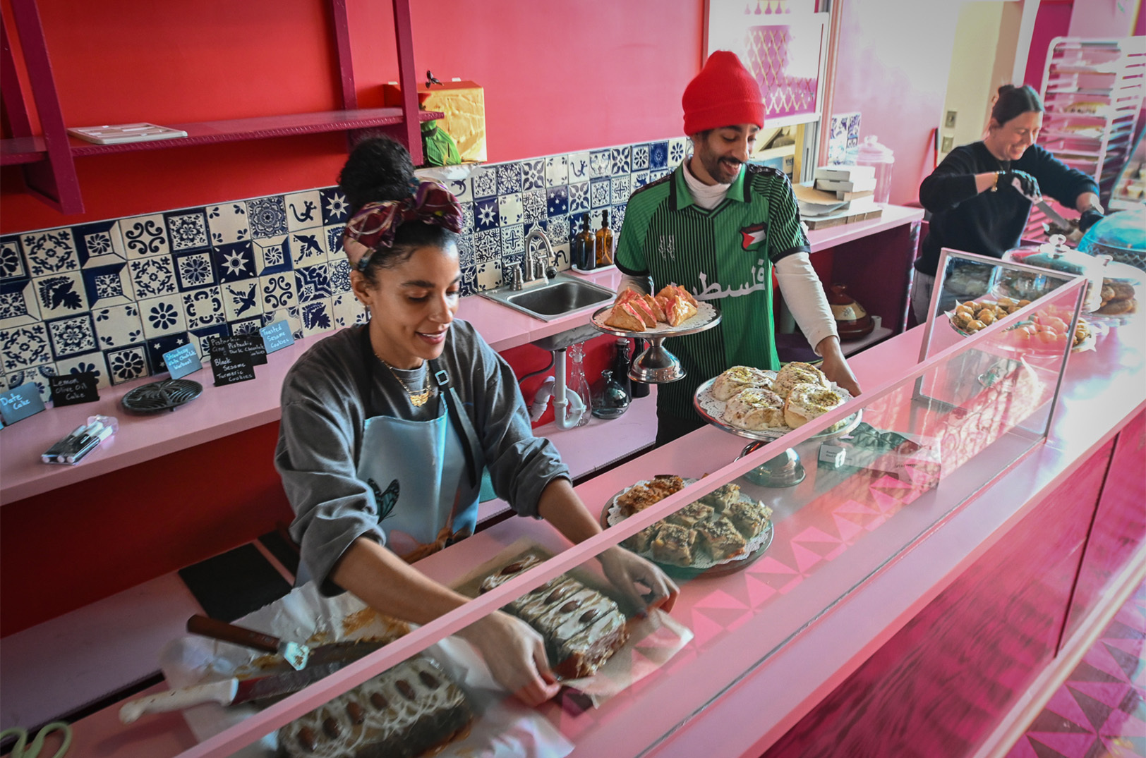 The building Baba’s Pantry occupies, on East 63rd Street in Kansas City, had been vacant for two decades when the Kamal family designed a space to show off their father’s culinary talents. The family now also operates a Palestinian bakery on Saturdays, right next to their cafe; photo by Carlos Moreno/KCUR