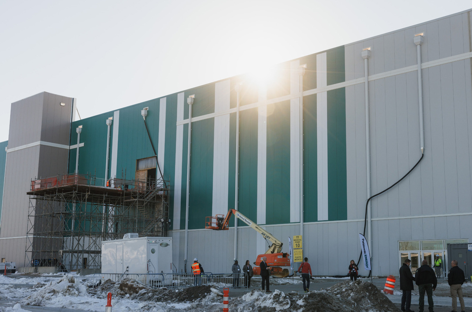 Morning sun peeks over the roof of the Panasonic EV Battery Facility in De Soto, Kansas, in mid-January; photo by Chase Castor, Flatland