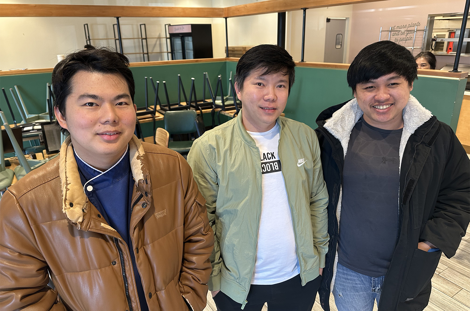 Ket Kiun Lo, left, and his brother, Christian Sen, and Chenni "C.J." Juanda, owners of the new Sannin restaurant; photo by Joyce Smith