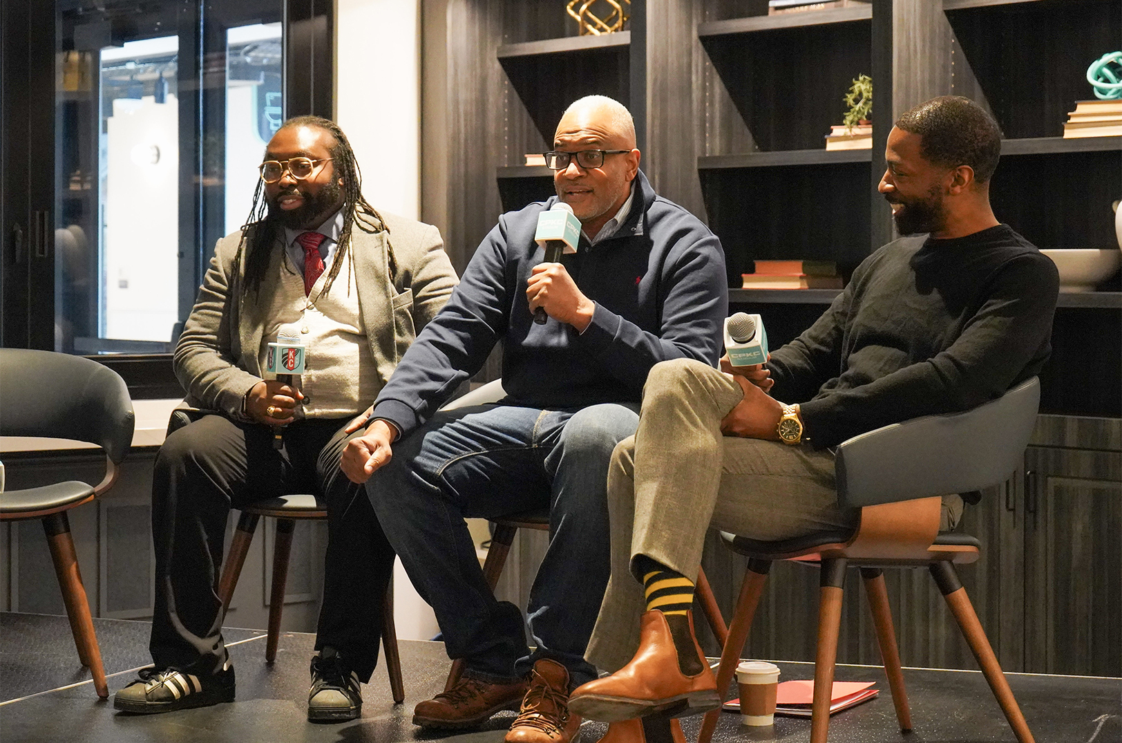 Tracey Lewis, EDCKC, center, speaks about the anticipated regional impact of the coming FIFA World Cup 2026 events in Kansas, alongside Dr. Lomax Campbell, Third Eye Network, and Steven Anthony, EDCKC, during a Small Business Task Force roundtable gathering at CPKC Stadium; photo courtesy of EDCKC