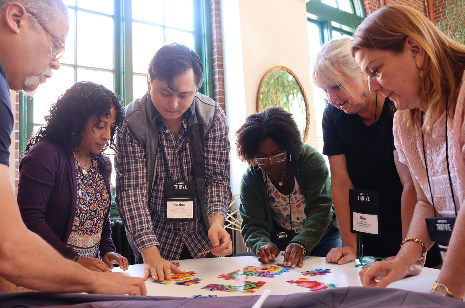 Participants at the 2024 Artists Thrive Summit in Winston-Salem, North Carolina, collaborate on an arts-based project; courtesy photo