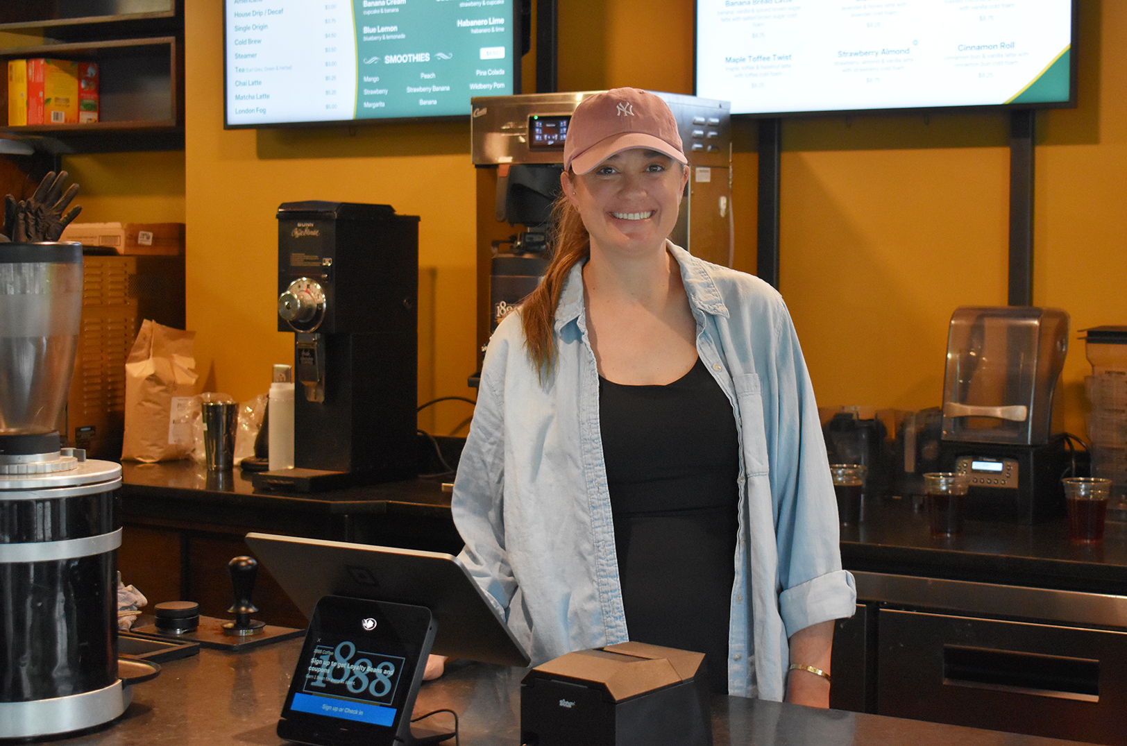 Christine Kehoe, co-owner and operator of 1888 Coffee with her husband Robert Kehoe, at the Hyde Park coffee shop; photo by Taylor Wilmore, Startland News
