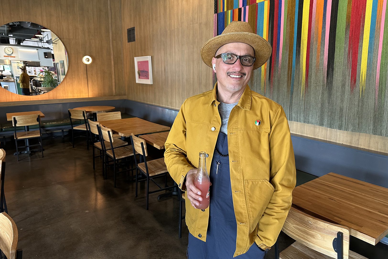 Chef Marwan Chebaro stands his new restaurant space, Nour's, at 3855 Warwick Blvd.; photo by Joyce Smith