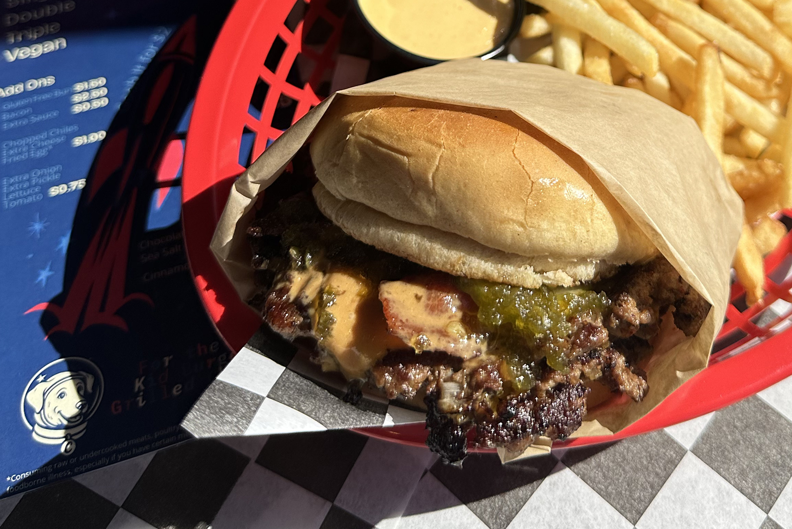 Smash burger and fries at Cosmo Burger XR in the East Crossroads; photo by Joyce Smith