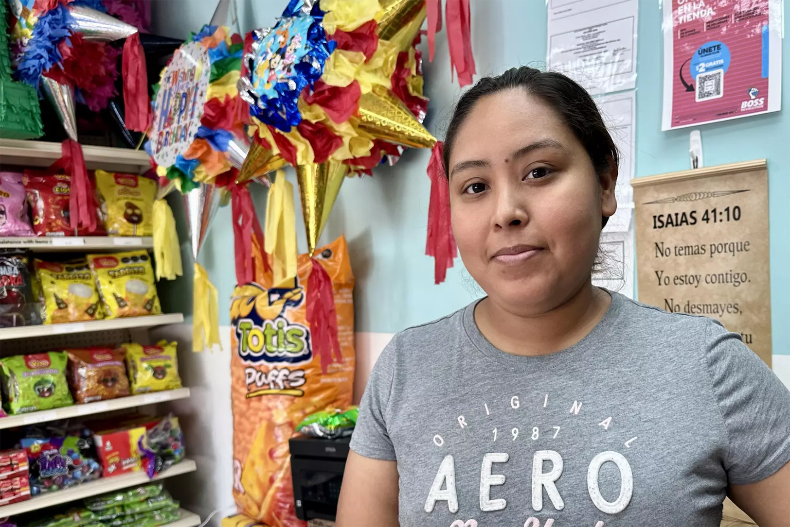 Party store owner Lucy Angel says she takes solace in her faith and believes that God will see her through the loss in business she’s suffering from President Trump’s immigration policies; photo by Frank Morris, KCUR