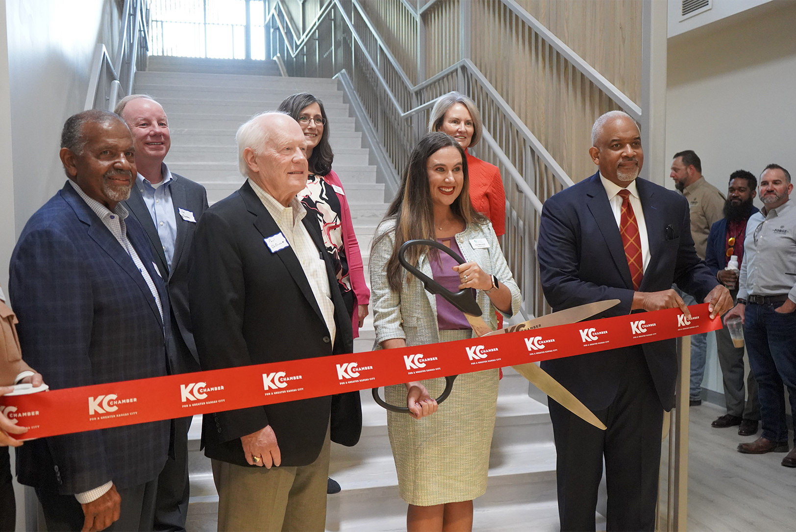 Civic and development leaders, partners, and community members gather for a ribbon cutting ceremony at the new headquarters for Behavioral Health Allies; photo courtesy of the Economic Development Corporation of Kansas City