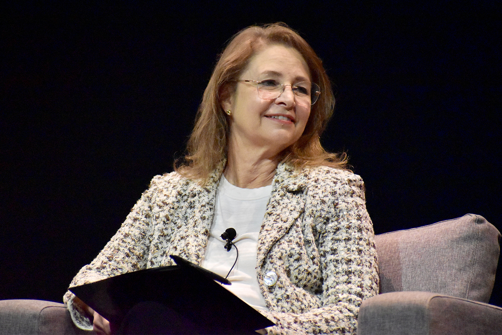 Tammie Wahaus, ELIAS Animal Health, speaks on stage during the KC Animal Health Corridor's Animal Health Summit; photo by Nikki Overfelt Chifalu, Startland News