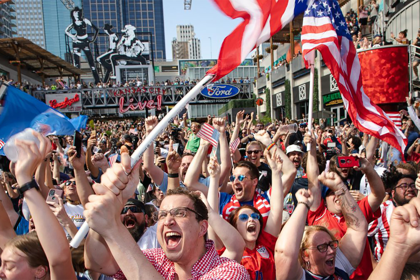 Soccer fans react to the official FIFA World Cup host city announcement June 16, 2022, at the Kansas City Power and Light District in Kansas City; photo by Zachary Linhares/The Beacon