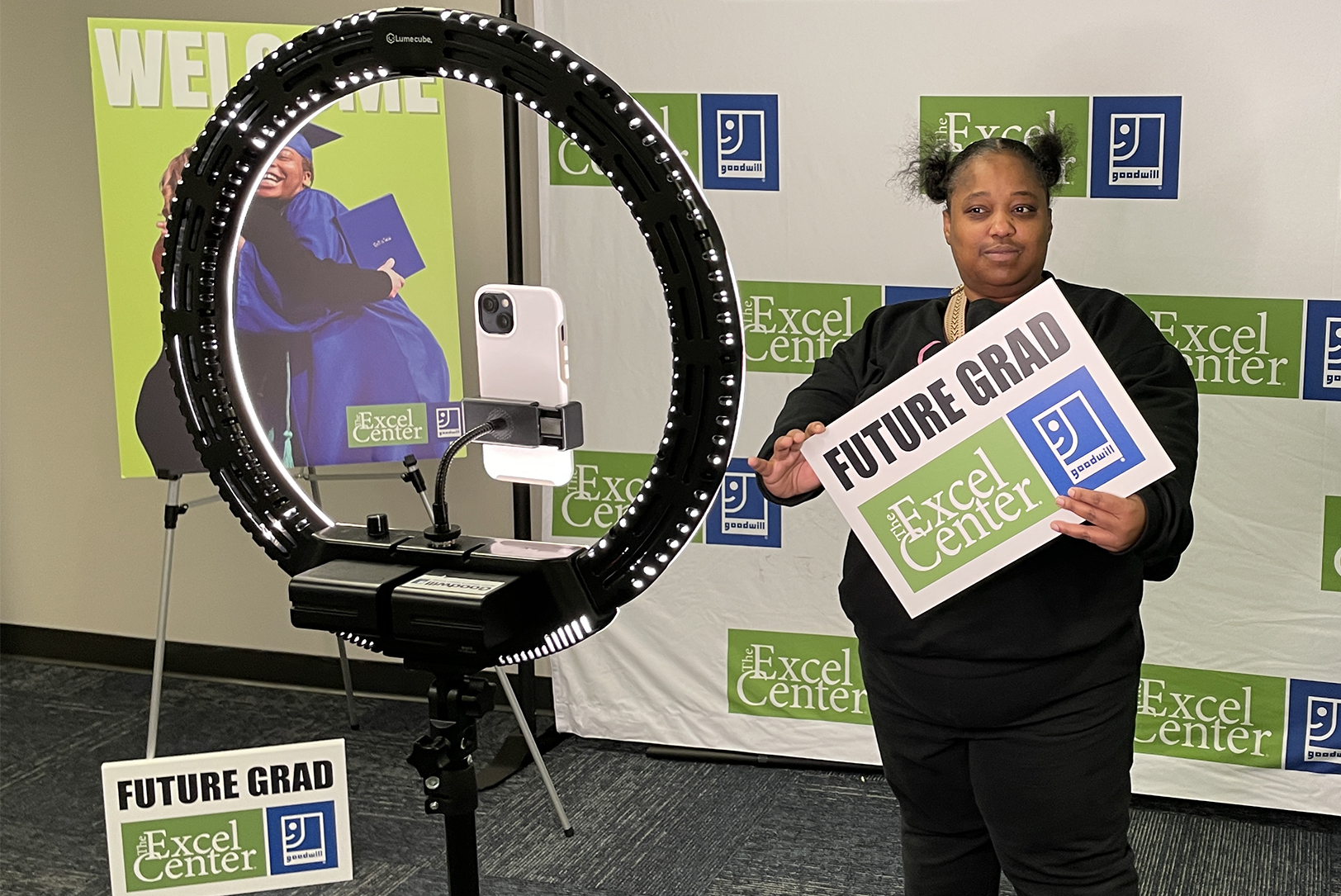 A student takes her first day of adult high school photo at the Excel Center on campus at Metropolitan Community College’s Penn Valley location; photo courtesy of MERS Missouri Goodwill