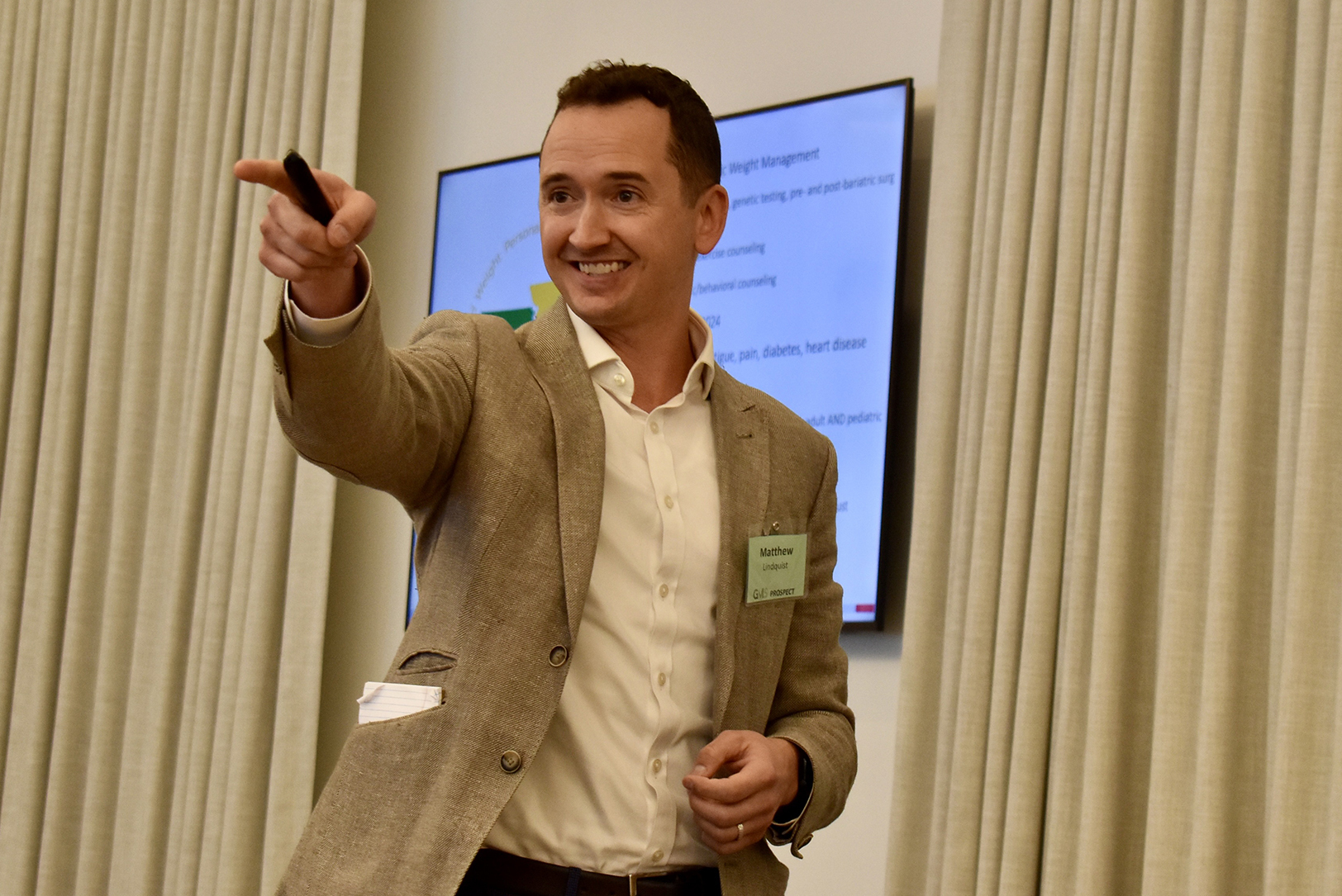 Mentor Matthew Lindquist, founder of MoKan Weight Loss and Metabolic Health, pitches his business during a monthly GMS meeting to match mentors and mentees; photo by Nikki Overfelt Chifalu, Startland News
