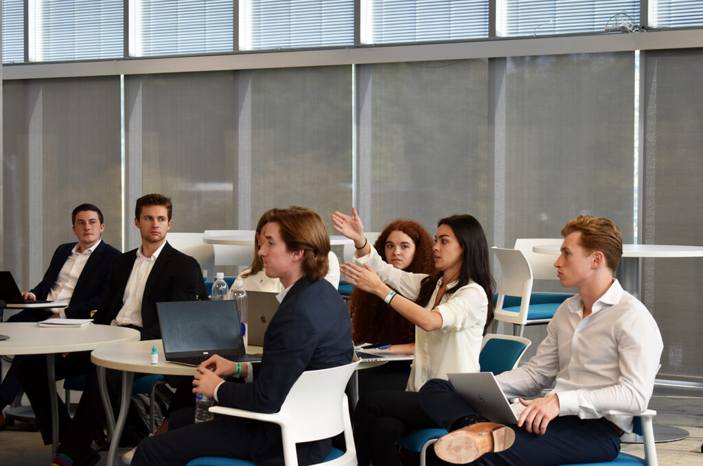 AACE Venture Fund students interacting with Shekhar Gupta, MyANIML, on the University of Missouri-Kansas City campus
