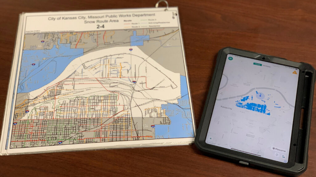 A traditional map lies beside the new technology snowplow drivers will be using to guide their routes. (Emily Wolf/The Beacon)