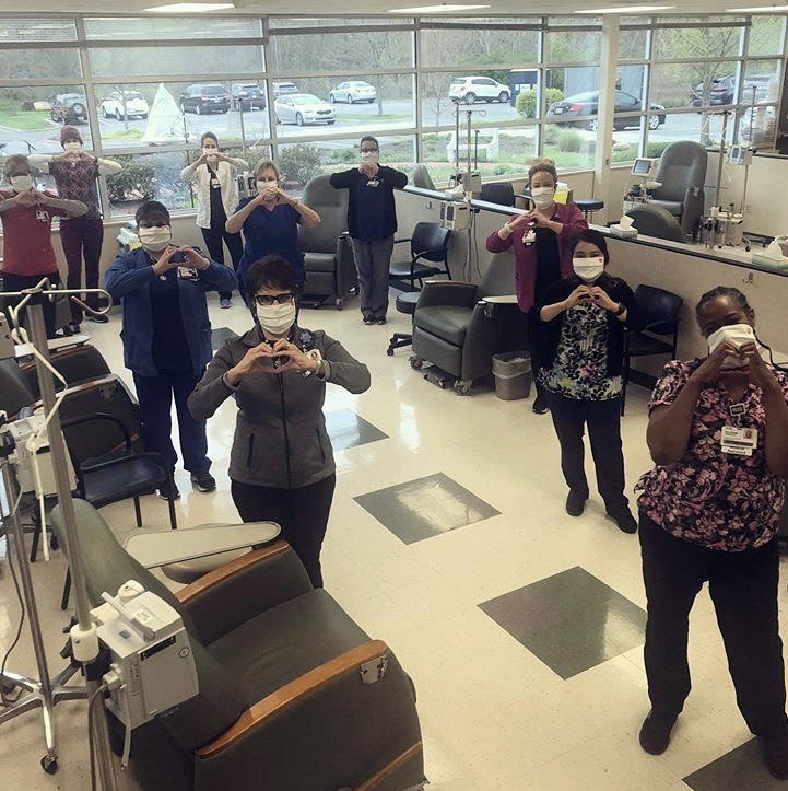 Medical professionals wearing Charlie Hustle face masks