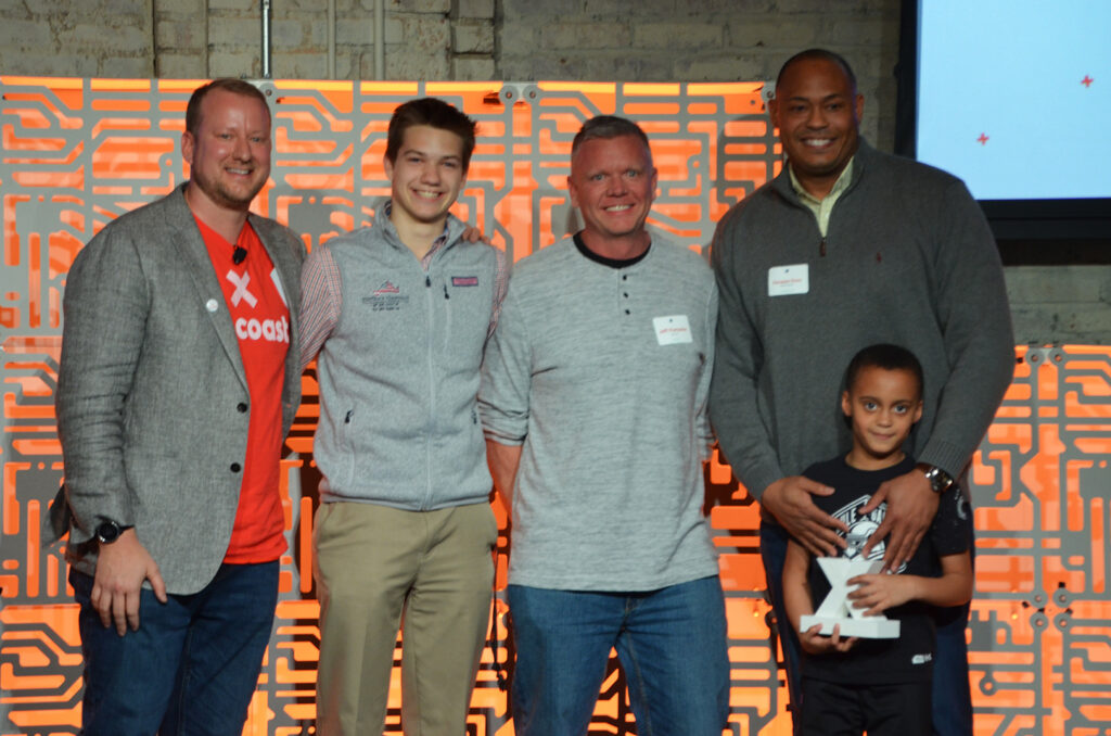 Ryan Weber, KC Tech Council; Ryder Jarrett, student intern; Jeff Portsche, Garmin; and Davyeon Ross, ShotTracker