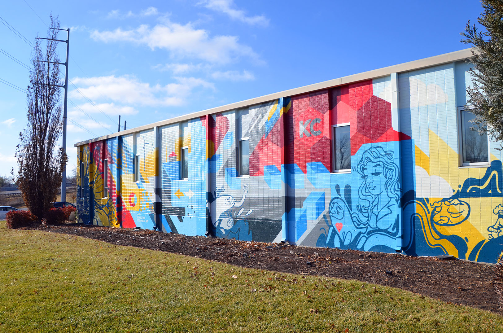 Mural by Phil “Sike Style” Shafer and JT Daniels, Plexpod Lenexa
